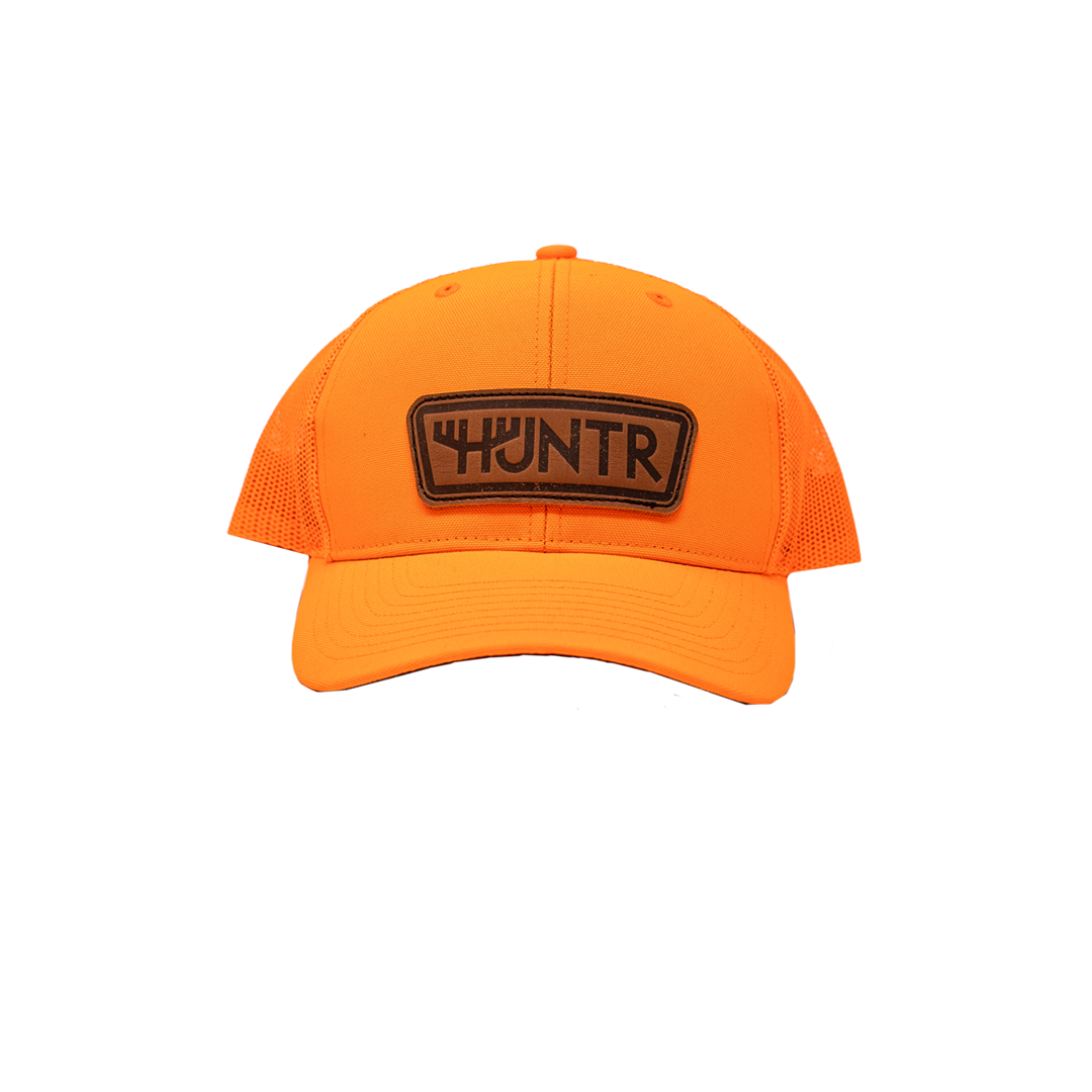 huntr logo orange hat side|huntr logo orange hat front