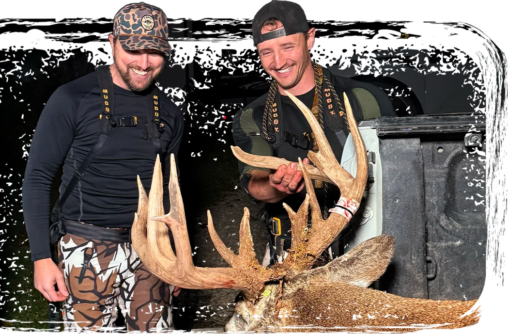 Hunters with a mature buck